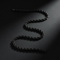 ROVIA Black Rope Chain on matte black surface with dramatic lighting