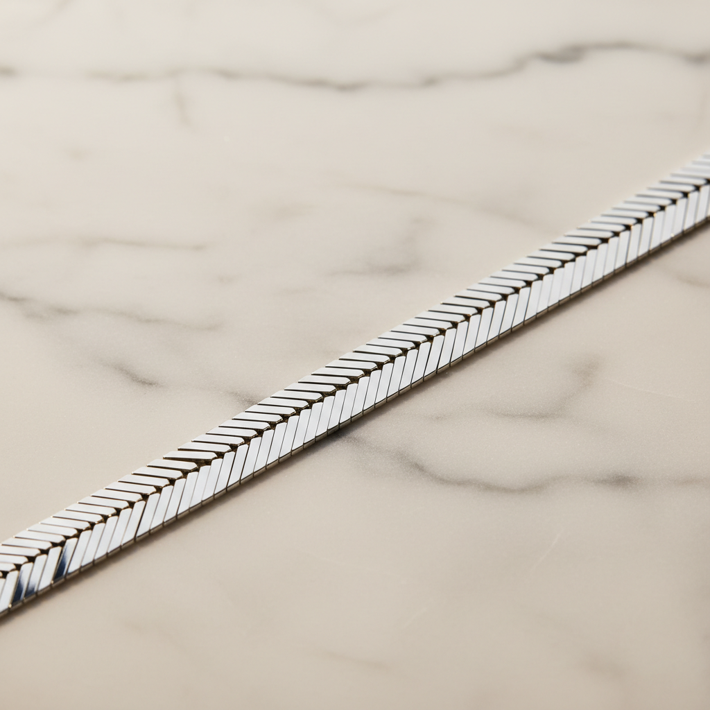 ROVIA Silver Herringbone Bracelet 8mm on white marble